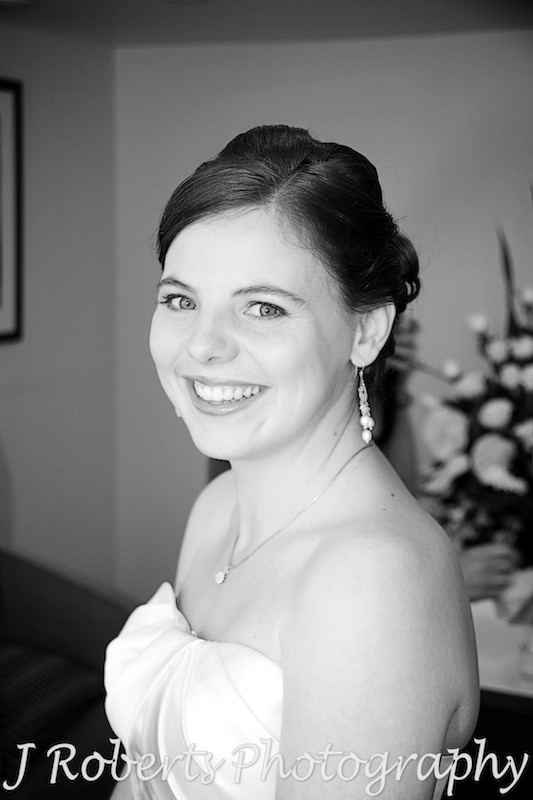 Smiling happy bride at Vibe Hotel - wedding photography sydney